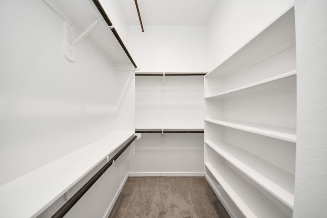 Spacious walk-in closet offering excellent storage | Image 31