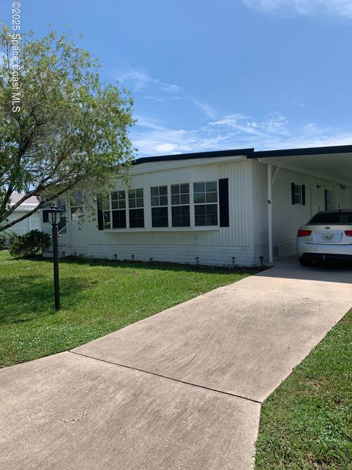 913 Fir St, Barefoot Bay, FL, 32976-7325 | Card Image