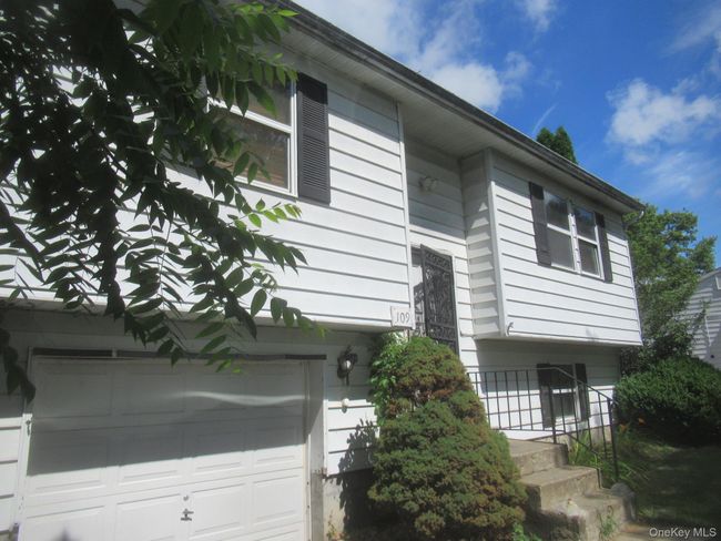 View of side of property with a garage | Image 6