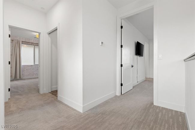 Corridor featuring baseboards and carpet flooring | Image 31