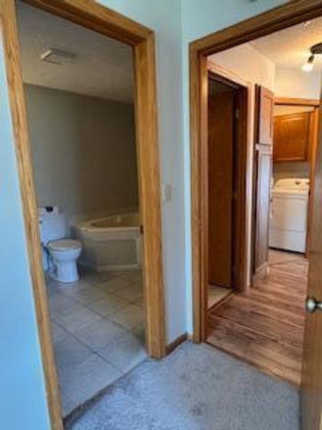 Bedroom 1 door t bathroom and hallway | Image 25