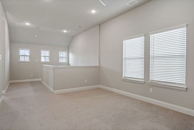 Empty room featuring visible vents, recessed lighting, and light carpet | Image 28