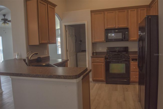 844 Haring Ln, House other with 3 bedrooms, 2 bathrooms and null parking in MOUNT DORA FL | Image 4