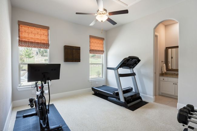 Main floor guest suite with ensuite and walk-in closet. | Image 22