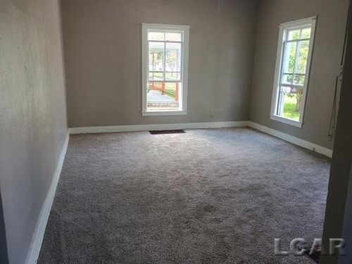 511 W Adrian St, Blissfield, MI, 49228-1003 | Card Image