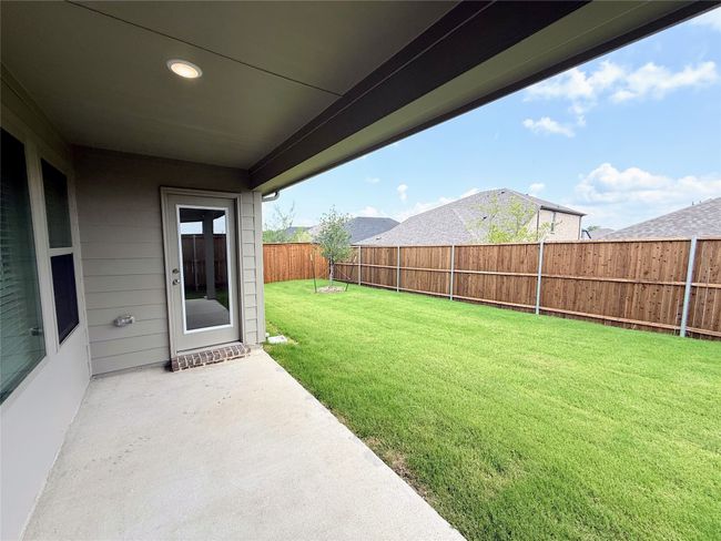 View of yard featuring a patio | Image 34