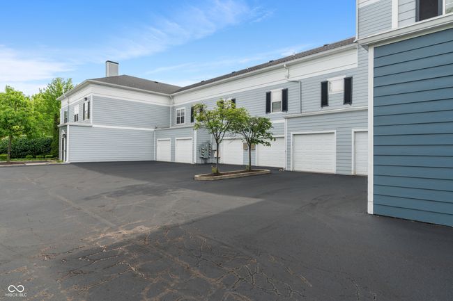 Back view of the building, garage entry door | Image 37