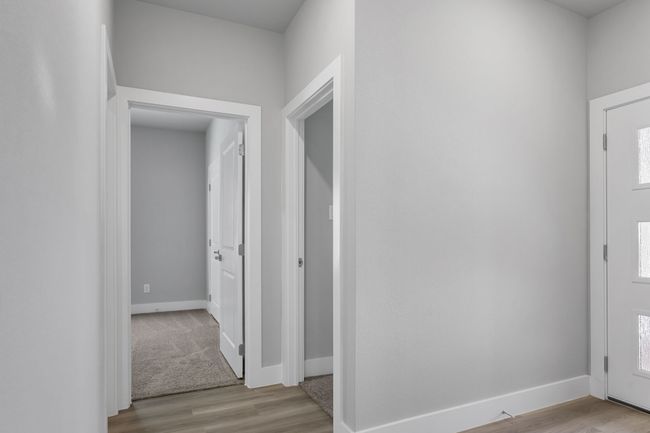 Foyer with baseboards and light wood-style floors | Image 18