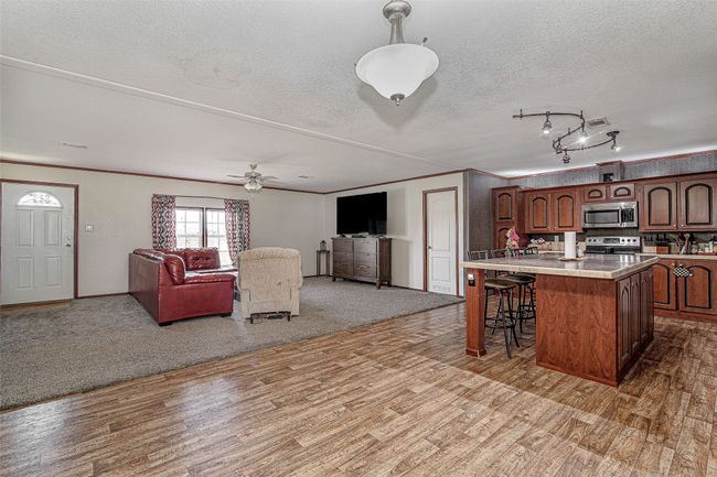 Main house - view of living area from the dining area | Image 7