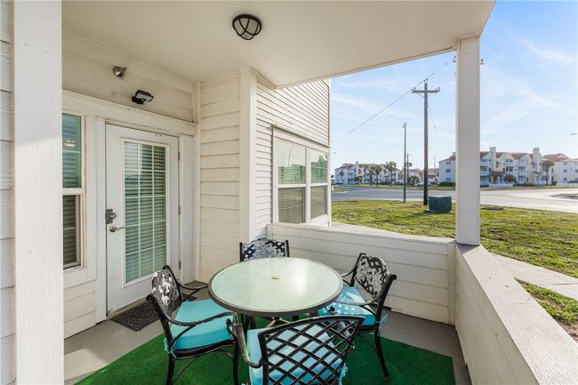 Covered patio to enjoy your morning coffee. | Image 12