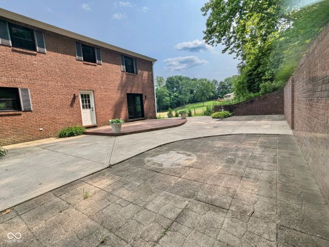 fenced backyard featuring a patio | Image 9