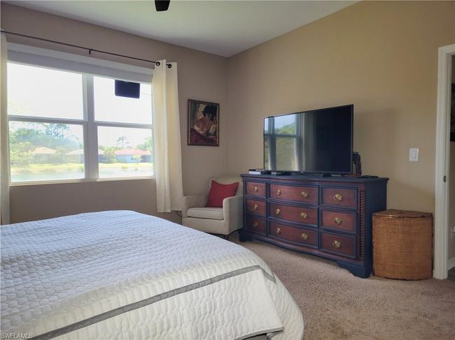 View of carpeted bedroom | Image 28
