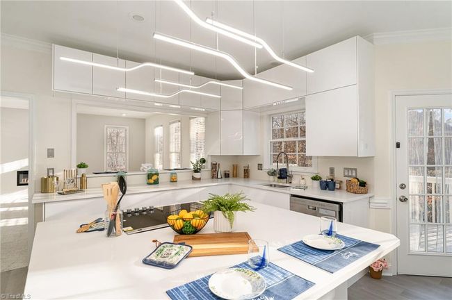 Spacious Kitchen Island with Bar seating | Image 17