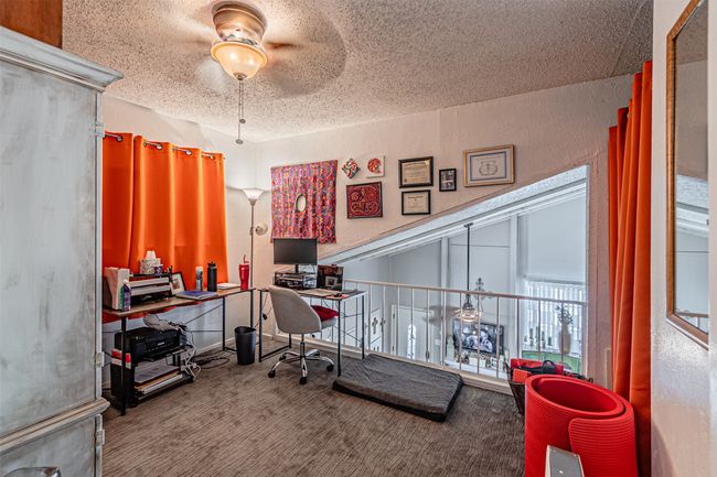 Office space with ceiling fan, a textured ceiling, and wood finished floors | Image 18