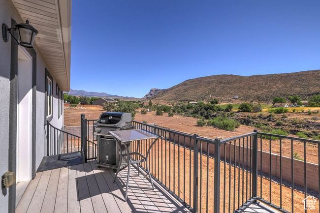 Wooden terrace featuring a mountain view | Image 26