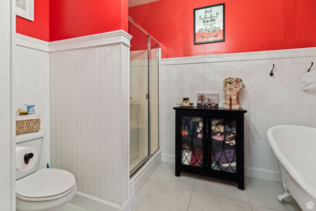 Bathroom with toilet and walk in shower | Image 69