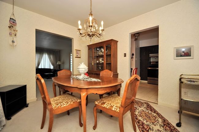It's right next to the kitchen and a door to the rear yard. You'll see that surprise, later in photos. | Image 13