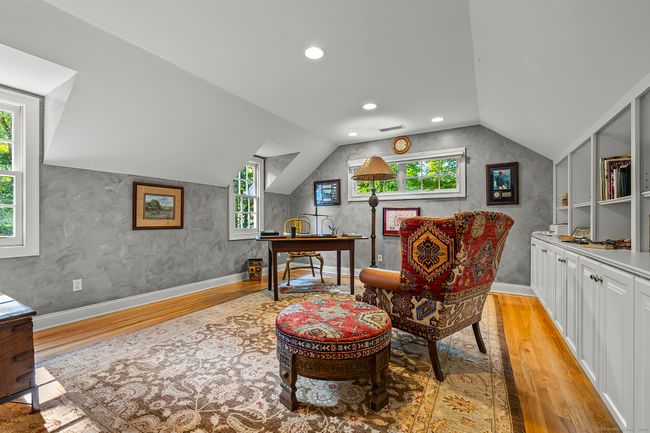 Sitting room / study with built-ins off the primary bedroom. | Image 28