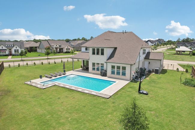View of swimming pool with a gazebo, a residential view, and a fenced backyard | Image 34