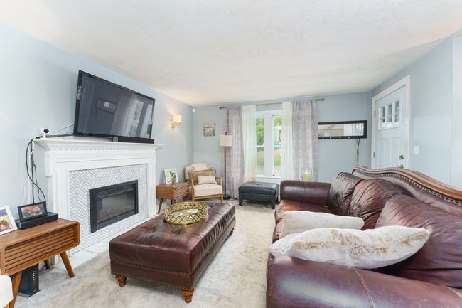 FIREPLACE MAKES IT SNUG AND WELCOMING. | Image 5