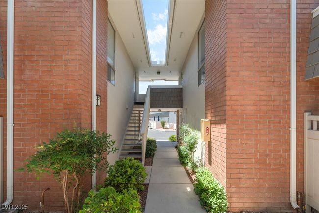 Entrance to property with brick siding | Image 11