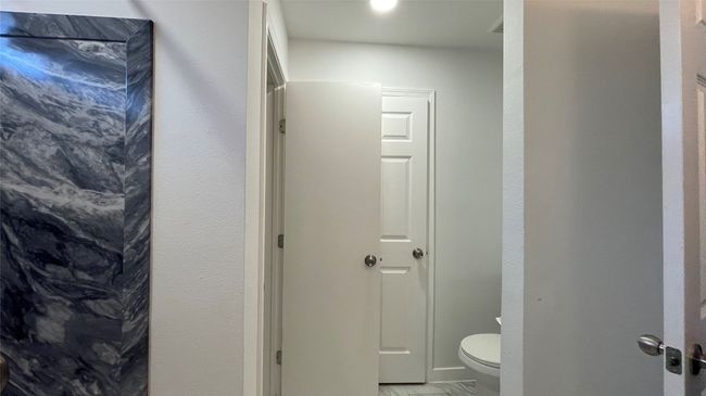Bathroom featuring toilet | Image 12