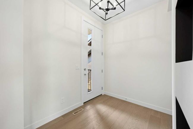 136 Crimson Ridge Place Nw, House other with 3 bedrooms, 3 bathrooms and 4 parking in Calgary AB | Image 4