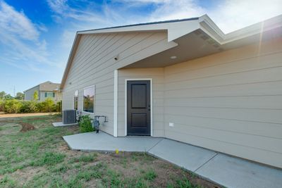 Back of house with central AC unit | Image 3