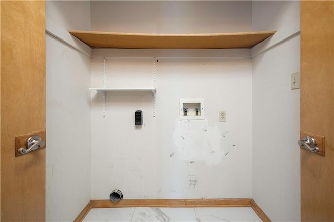 Laundry area featuring hookup for a washing machine and baseboards | Image 25