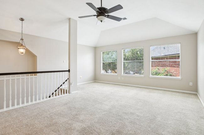Flexible upstairs loft area—perfect for a media room, playroom, or second living space. | Image 20