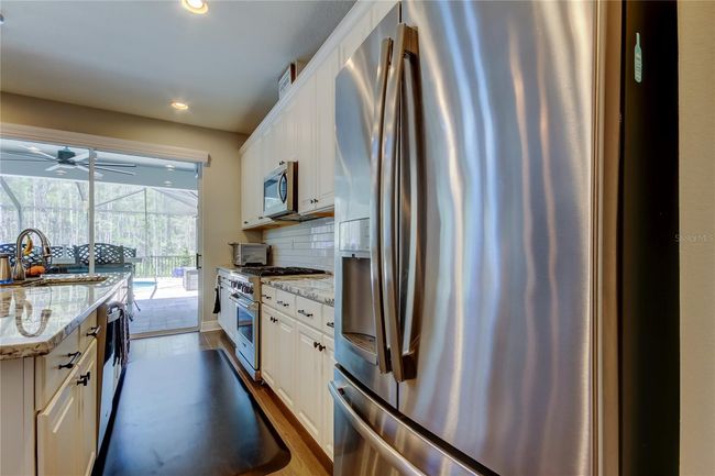 14975 Renaissance Ave, House other with 4 bedrooms, 3 bathrooms and null parking in ODESSA FL | Image 15