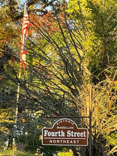 Outside of structure showing street sign | Image 2