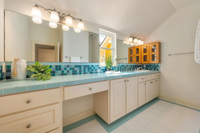 Ensuite primary bathroom with a huge single vanity that is plumbed for a 2nd sink and a walk-in shower | Image 25