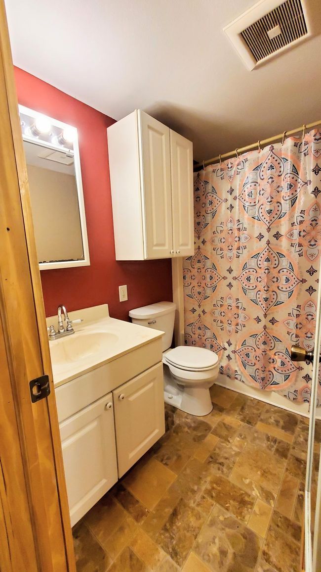 spacious bathroom | Image 13