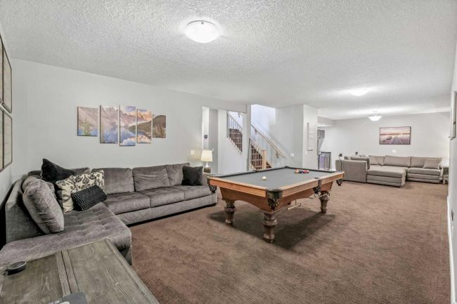 425 Boulder Creek Way Se, Home with 4 bedrooms, 3 bathrooms and 6 parking in Langdon AB | Image 35