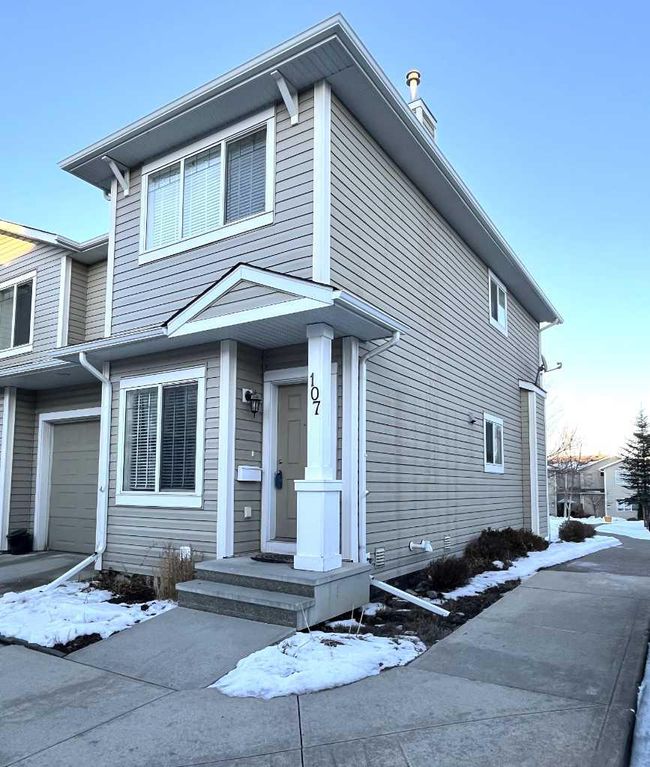 107 Bridleridge Manor Sw, Home with 3 bedrooms, 2 bathrooms and 1 parking in Calgary AB | Image 2