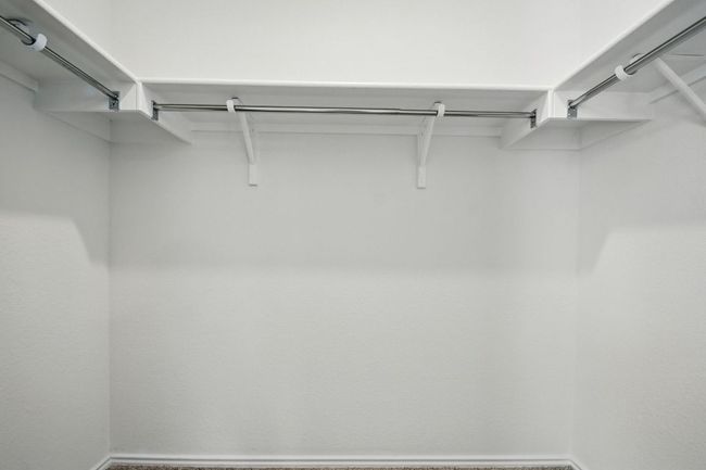 View of spacious closet | Image 19