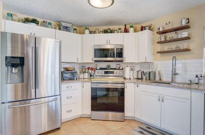 103 - 6 Greenway N, Condo with 2 bedrooms, 2 bathrooms and null parking in Royal Palm Beach FL | Image 1