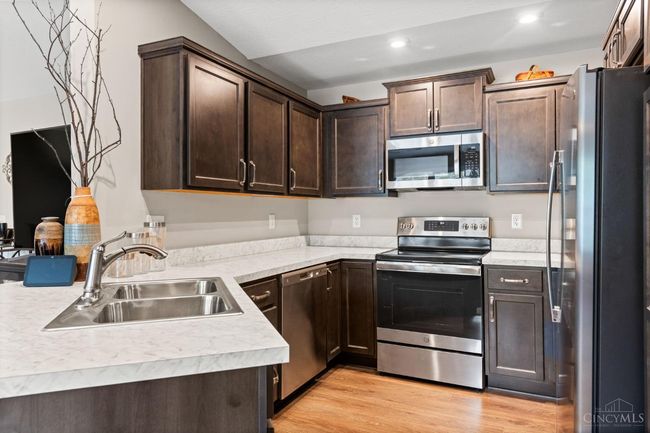 Ample counter space and cabinetry for storage. | Image 13