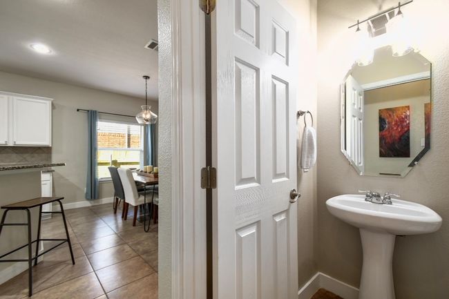There is a powder room/half bathroom on the main level, perfect for guests. | Image 15