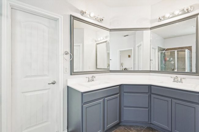 Full bathroom with a stall shower and double vanity | Image 17