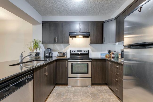 960 Windsong Dr Sw, Home with 3 bedrooms, 2 bathrooms and 4 parking in Airdrie AB | Image 11