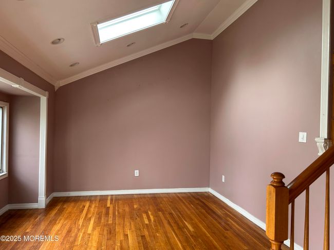 Skylight in Great Room or Living Room on 2 Level of this fine Split Level Home. | Image 13