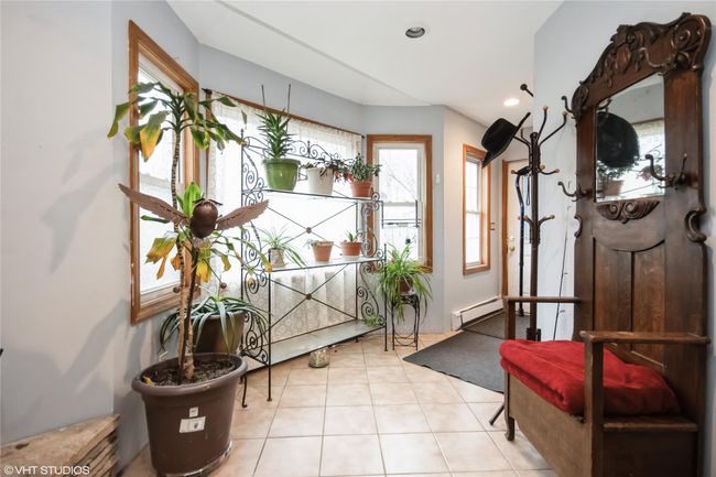 Tiled foyer featuring recessed lighting and baseboard heating | Image 5