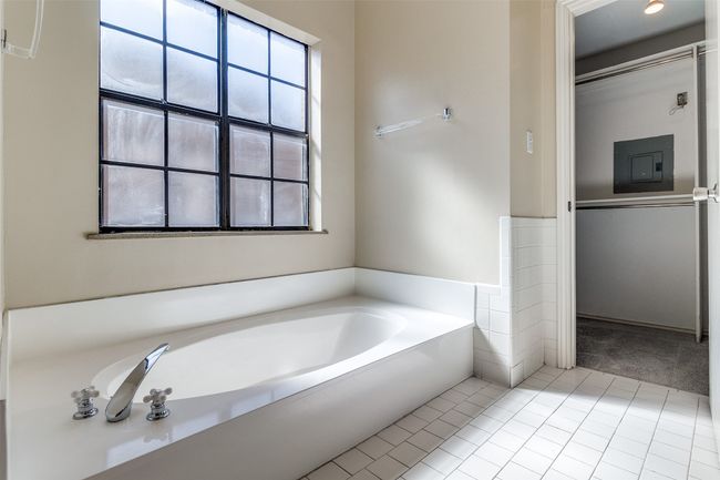 Garden Tub and view of closet. | Image 17