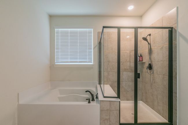 Bathroom with a garden tub and a shower stall | Image 30