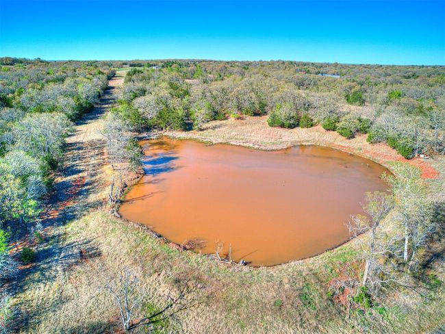 Birds eye view of property featuring a wooded view and a water view | Image 5