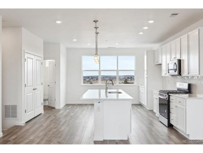 6814 Merseyside Ln, Townhouse with 3 bedrooms, 3 bathrooms and null parking in Castle Pines CO | Image 10