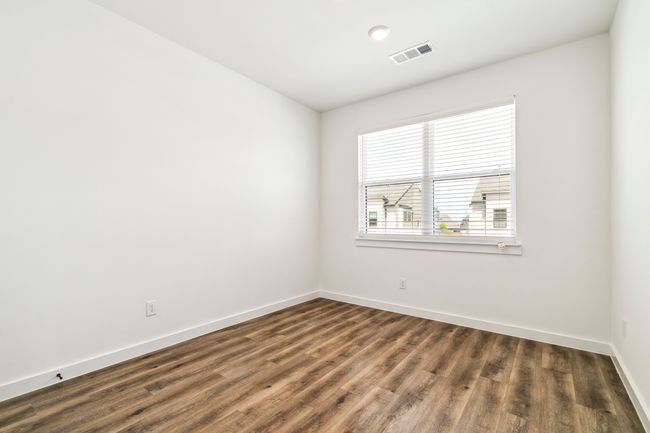 Unfurnished room featuring baseboards and dark wood-style flooring | Image 25
