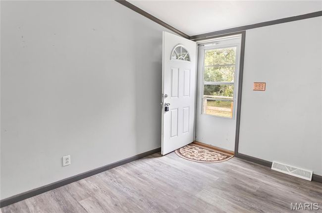 Foyer entrance featuring newer flooring | Image 5